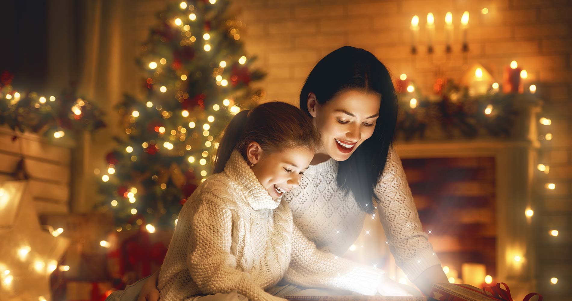 Mom and daughter opening presents