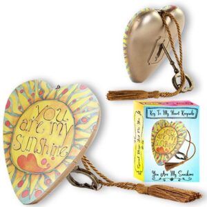 Presenting a darling heart-shaped memento, showcased with its packaging, adorned with the uplifting message "you are my sunshine", splendidly attached to a practical keychain. This charming product is offered in our fundraising catalog designed exclusively for schools and organizations looking to generate significant funds through unforgettable holiday fundraisers. Add the element of warmth this festive season while also supporting your institution's goals.