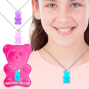 Introducing our delightful Gummy Bear Necklace Collection, the perfect addition to your holiday fundraising catalog! Picture this: a young girl adorned with our charming gummy bear-shaped necklace, a true centerpiece of joy and whimsy. The collection includes an array of necklaces featuring vibrant pink plastic bear-shaped containers, along with additional captivating pieces in blue and purple. These delightful accessories are not just fashion statements but also wonderful conversation starters. Imagine the excitement as parents and community members browse through your catalog, eager to support your cause by purchasing these unique and playful items. With every sale, you're not only spreading holiday cheer but also generating vital funds for your school or organization. Make this season truly special by offering products that shine as brightly as the spirits they uplift. Choose our Gummy Bear Necklace Collection for a fundraiser that's both memorable and profitable!.