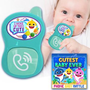 Introducing our delightful holiday fundraising catalog item: the "I Woke Up This Cute" Baby Rattle! Perfect for capturing hearts this season, this charming turquoise toy phone rattle features playful cartoon sharks and proudly displays the message, "Cutest Baby Ever," on its packaging. Help your school or organization raise funds while offering supporters an adorable gift that's sure to be a hit with families—order now to make your fundraiser memorable!.