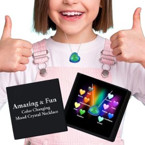 Introducing our delightful fundraising opportunity that effortlessly combines fun and style! Picture this: a cheerful girl giving a big thumbs up, proudly wearing our whimsical Heart-Shaped Color-Changing Mood Crystal Necklace. In front of her sits an enticing box labeled "Amazing & Fun Color-Changing Mood Crystal Necklace," ready to captivate the hearts of your supporters. Offer this magical item in your next holiday fundraiser, and watch excitement blossom as sales contribute to your goals!.
