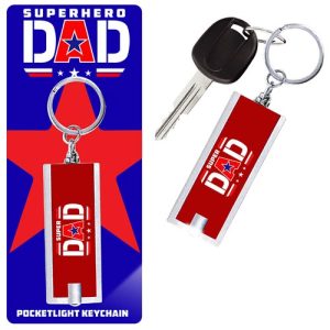 Introducing our "Super Dad" Red Pocketlight Keychain, the perfect addition for your school's holiday fundraising catalog! Delight supporters with this compact and stylish keychain, featuring a powerful LED light encased in a vibrant red shell. Each piece comes thoughtfully packaged, adding an extra touch of elegance that's ideal for gifting. Perfect for Father's Day or any occasion to celebrate the everyday heroes in our lives. Boost your fundraiser success by offering this practical yet charming accessory that every Super Dad will appreciate!.