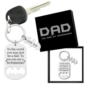 Unleash the power of heartfelt gifting this holiday season with our exclusive fundraising collection! Presenting the "Superhero Dad Keychain Set" - a perfect way for schools and organizations to raise funds while spreading cheer. Each set features: - A sleek keychain adorned with the iconic Batman logo, showcasing strength and courage. - An inspiring dog tag inscribed with: "To the world you may just be a dad. To me, you are a SUPERHERO," paired perfectly with a heart charm, symbolizing affection and respect. - Beautifully packaged in an elegant box featuring bold text: "DAD YOU ARE MY SUPERHERO," making it an ideal present that speaks volumes. Our catalog offers remarkable products like this one to create meaningful moments while supporting your fundraising goals. Join us in making a lasting impact today!.