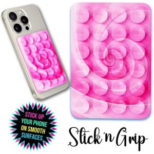 Product Description for School and Organization Fundraising Catalog: Pink Spiral Phone Grip & Stand Add a touch of style and functionality to your smartphone with our Pink Spiral Phone Grip & Stand! Perfect as a fun holiday gift or stocking stuffer, this chic accessory not only enhances your device's appearance but also provides practical benefits. - Stick 'n Grip Magic: Easily attach your phone to smooth surfaces for hands-free convenience. - Stylish Design: Featuring an eye-catching pink spiral pattern that adds flair to any device. Support your school or organization's fundraising efforts while enjoying the perks of this versatile phone accessory. Make every call, selfie, or video chat easier with the Pink Spiral Phone Grip & Stand—a must-have this holiday season!.