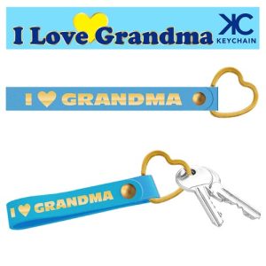 Introducing our charming "I ♥ Grandma" Blue Keychain, the perfect addition to your holiday fundraising catalog! This delightful accessory features a vibrant blue design with a heartfelt message and comes complete with a durable heart-shaped metal ring to keep all your keys secure. It’s an ideal gift that grandparents will cherish, making it a top choice for schools and organizations looking to raise funds this season. Elevate your fundraiser by offering products that connect families and spread holiday cheer!.