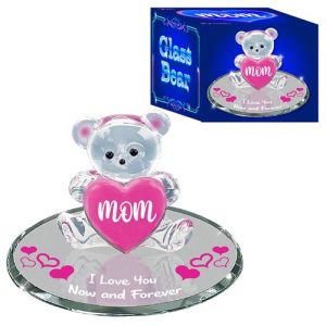 Presenting a beautifully crafted gift from our holiday fundraising catalog—a charming glass bear figurine that embodies love and appreciation. This delightful piece features an adorable bear tenderly holding a pink heart inscribed with "MOM," set atop an elegant mirrored base adorned with delicate pink hearts. The touching phrase "I Love You Now and Forever" embellishes this keepsake, making it the perfect gift for mothers who deserve to be cherished. Packaged in a stylish box marked subtly with "Glass Bear," this exquisite figurine is not only a thoughtful present but also a wonderful way to support your fundraising goals this holiday season. Enhance your fundraiser’s offerings with sentimental treasures like these, perfect for heartwarming gifts that contribute meaningfully to your cause.